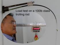 This image shows a trolling rod be ing tested. Osprey spinning rods will also ungo the same curve test load when the blank is formed.